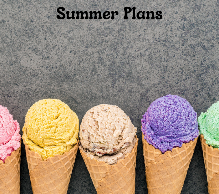 Four ice cream cones with different colored scoops on a gray background